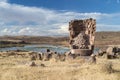 Sillustani Ancient burial ground with giant Chullpas cylindrical funerary towers built by a pre-Incan people near Lake Umayo in P Royalty Free Stock Photo