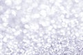 Sillver bokeh texture. Festive glitter background with defocused lights Royalty Free Stock Photo