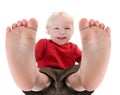 Silly Baby Boy Lying on His Back Laughing Royalty Free Stock Photo