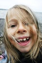 Silly girl showing teeth Royalty Free Stock Photo