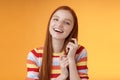 Silly good-looking flirty lively redhead young girl laughing playing coquettish ginger hair strand chuckling amused