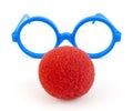 Silly, goofy face with round plastic blue glasses and sponge clown nose