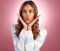 Silly, goofy and young woman in a studio with a funny, comic or crazy facial expression. Humor, joke and female model Royalty Free Stock Photo