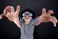 Silly little boy in black hat Royalty Free Stock Photo