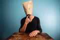 Silly man with a bag over his head Royalty Free Stock Photo