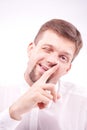 Silly man picking his nose Royalty Free Stock Photo