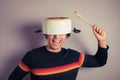 Silly young man with pot on his head Royalty Free Stock Photo