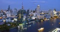 Silom, Sathorn and Chao Phraya river by night in Bangkok