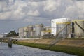 Silos along a canal Royalty Free Stock Photo