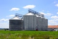 Silos in the field Royalty Free Stock Photo