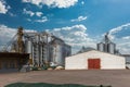 silos granary elevator on agro-industrial complex with seed cleaning and drying line for grain storage Royalty Free Stock Photo