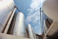 Silos and tank - industrial infrastructure Royalty Free Stock Photo