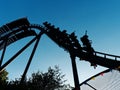 SIlouette people having fun rollercoaster ride