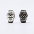 Silver accessories component with Buddha`s head Royalty Free Stock Photo