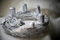 Silver advent wreath with silver candles and decorative white dove. Royalty Free Stock Photo