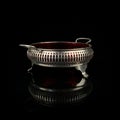 Metal retro sugar bowl on black background Royalty Free Stock Photo