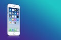 Silver Apple iPhone 7 with iOS 10 on the screen on blue gradient background with copy space Royalty Free Stock Photo