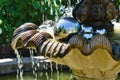 Silver Balls covered in water from splashing fountain Royalty Free Stock Photo