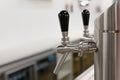 Silver beer taps in a pub Royalty Free Stock Photo
