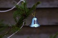 Silver bell hanging on a Christmas tree Royalty Free Stock Photo