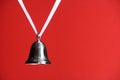 Silver Bell on Red Royalty Free Stock Photo
