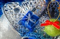 Silver bells and blue balls with blue mesh. Decorations for the New Year and Christmas Royalty Free Stock Photo