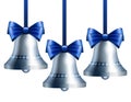 Silver bells with blue ribbon Royalty Free Stock Photo