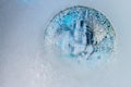 Silver Bitcoin, bit coin online digital currency frozen in the blue ice. Concept of block chain, crypto market crash. Frozen Royalty Free Stock Photo