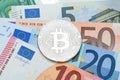 Silver Bitcoin close-up. Background euro currency. Conceptual ph Royalty Free Stock Photo