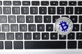 Silver bitcoin on computer keyboard. Space for text Royalty Free Stock Photo