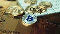 Silver bitcoin cymbol on keyboard. Selective focus.