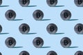 Silver bitcoin seamless pattern with sharp shadows repeat on blue background. Seamless colorful pattern of Bitcoin