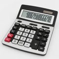 Silver and Black Calculator with Large Display and Solar Panel on a White Background Royalty Free Stock Photo