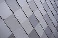 Silver blue metal shiny vivid rooftop tile panels Royalty Free Stock Photo