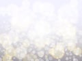 Silver bokeh background. Christmas backdrop concept. Abstract blurred lights. Bright glowing dust and sparkle. Festive