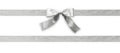 Silver bow ribbon band satin grey stripe fabric isolated on white background with clipping path for Christmas holiday gift box Royalty Free Stock Photo