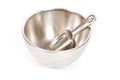 Silver bowl with measuring scoop isolated Royalty Free Stock Photo