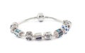 Silver bracelet with beads on white Royalty Free Stock Photo