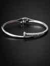 Silver bracelet isolated on black background Royalty Free Stock Photo