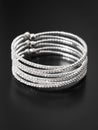 Silver bracelet isolated on black background Royalty Free Stock Photo