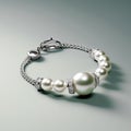 Silver bracelet with pearls on a gray background