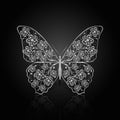 Silver butterfly with floral pattern.