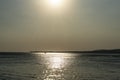 Silver calm Black Sea at sunset. The solar path on the water makes the landscape peaceful Royalty Free Stock Photo