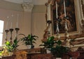 silver candelabra on altar in ancient italian church