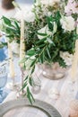 Silver candlestick as element of festive table wedding decorations. Royalty Free Stock Photo