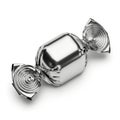 Silver candy wrapped in twist paper isolated on white background Royalty Free Stock Photo