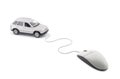 Silver car connected to computer mouse Royalty Free Stock Photo