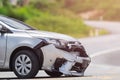 Silver car get damaged by crash accident on the road. Car repair Royalty Free Stock Photo