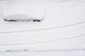 Silver car under the snow - image