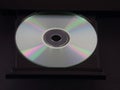 Silver CD or DVD in an Ejected Tray of a Multimedia Player Royalty Free Stock Photo
